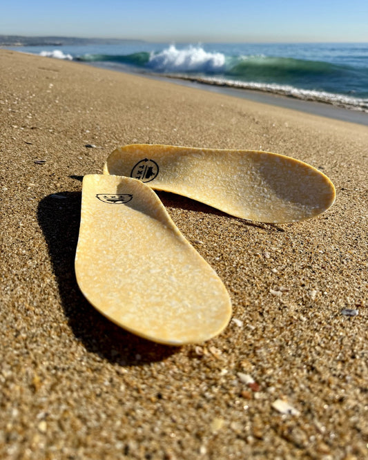 SUBTXT recycled performance foam insoles on the beach