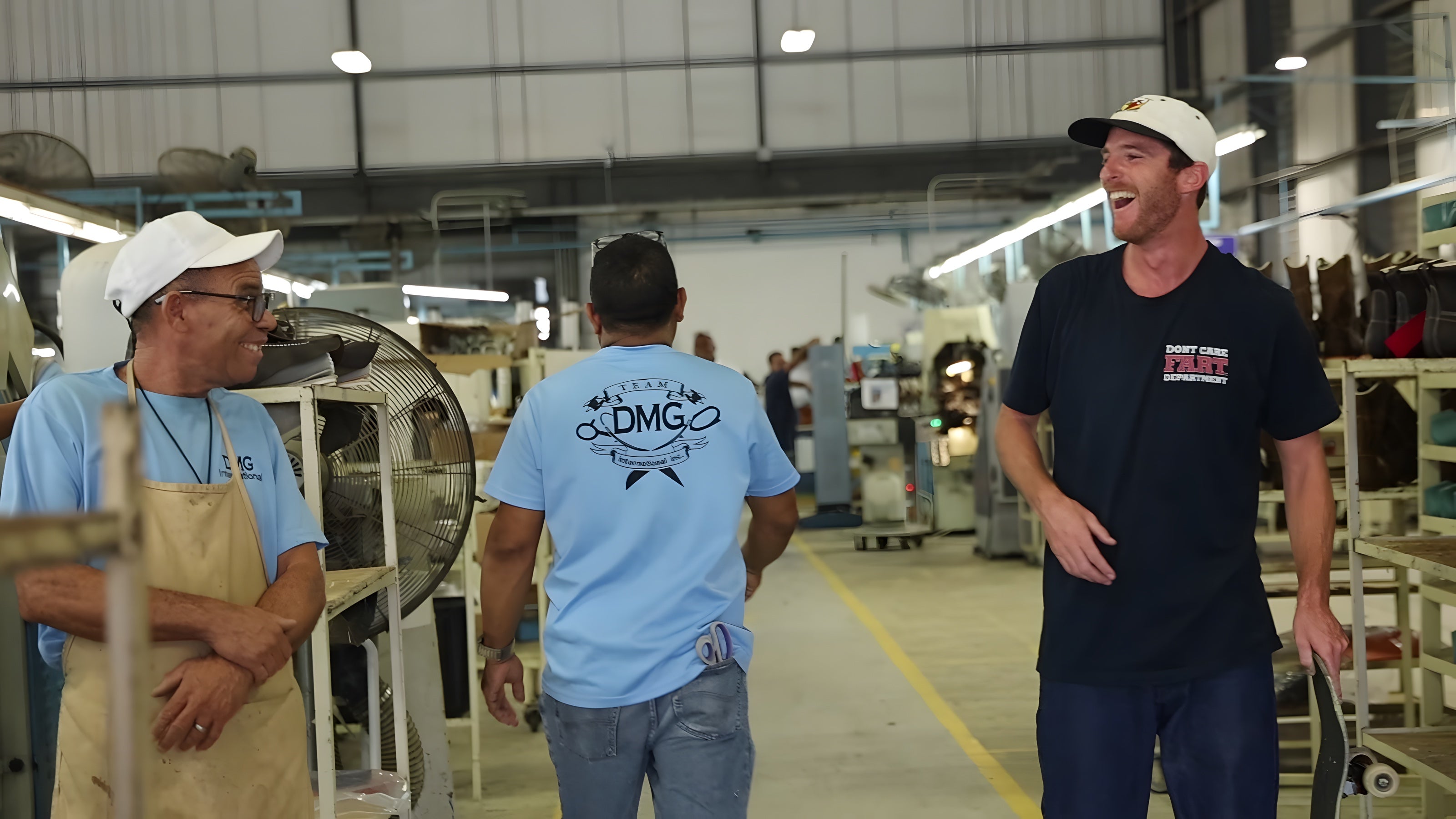 Hex laughing with the crew on the DMG International factory floor