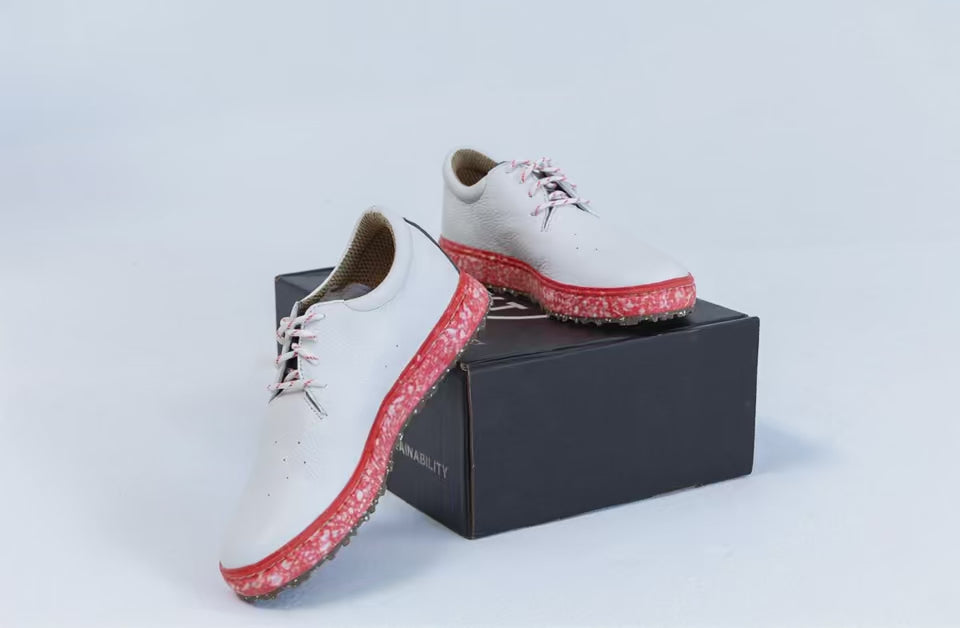 SUBTXT Golf Shoe in white premium leather with a red Blumaka recycled performance foam midsole, rotating view
